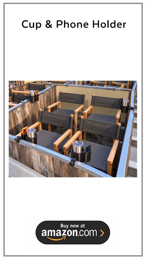 Cup and phone holders attached to the railings of a Hollywood Bowl box